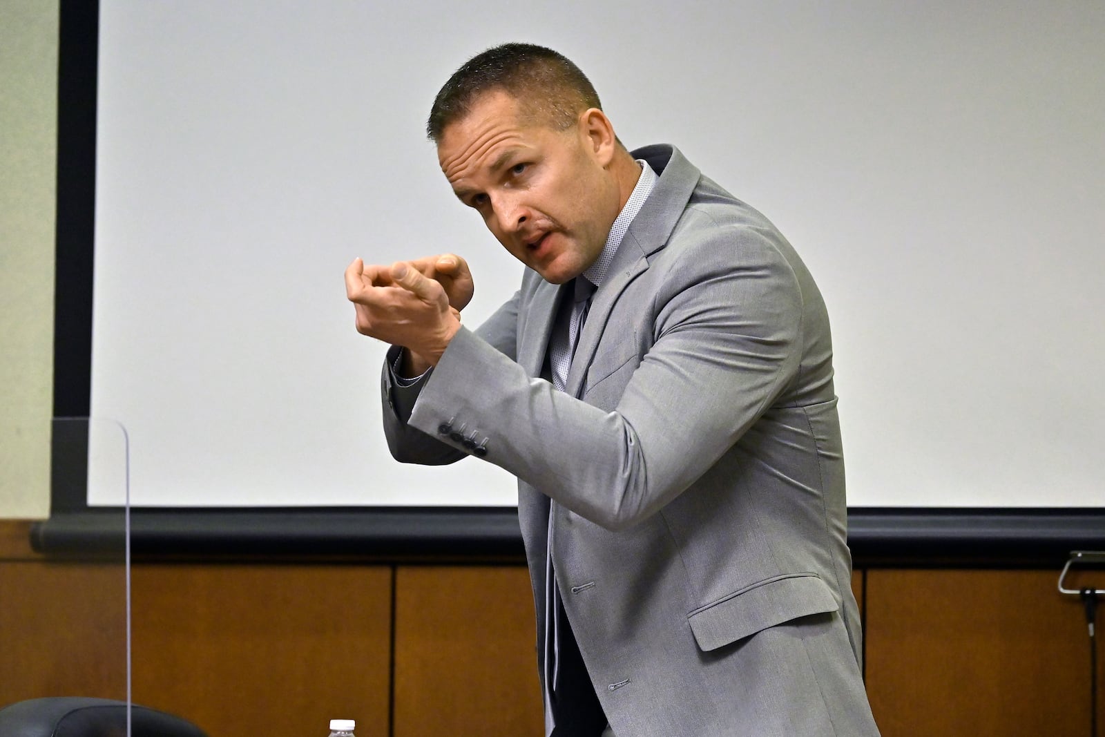 FILE - Former Louisville Police officer Brett Hankison describes what he saw in the apartment of Brionna Taylor during testimony Wednesday, March 2, 2022, in Louisville, Ky. (AP Photo/Timothy D. Easley, Pool, File)