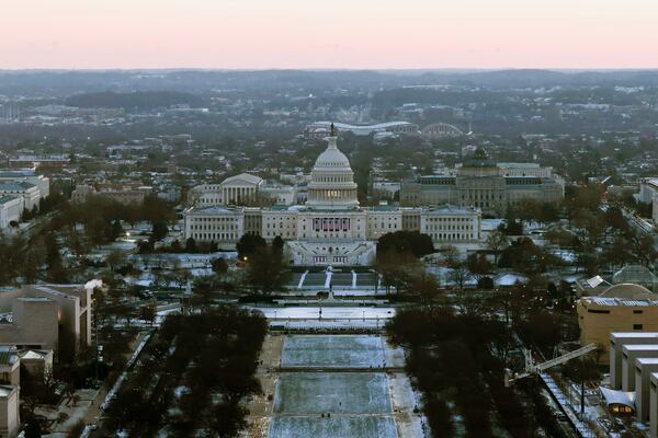 The U.S. Capitol is seen from the top of the Washington Monument at dawn on Inauguration Day, Monday, Jan.20, 2025 in Washington. (Brendan McDermid/Pool Photo via AP)