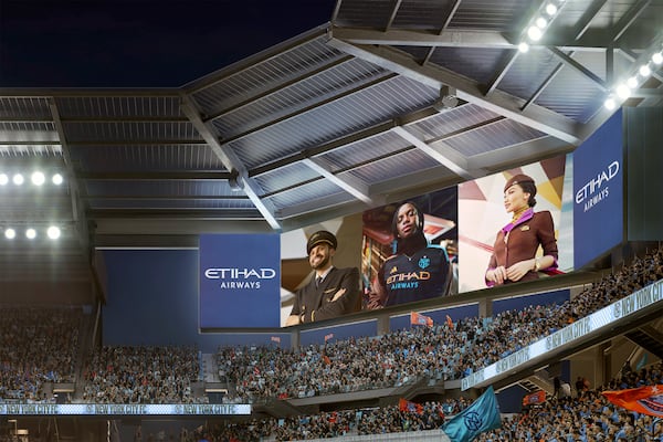 EMBARGOED UNTIL 9AM ET THURSDAY, NOV. 21 - This artists rendering provided by New York City FC shows the MLS soccer team's $780 million, 25,000-seat venue that it intends to open next to the Mets' Citi Field in New York in 2027. (HOK/NYCFC via AP)