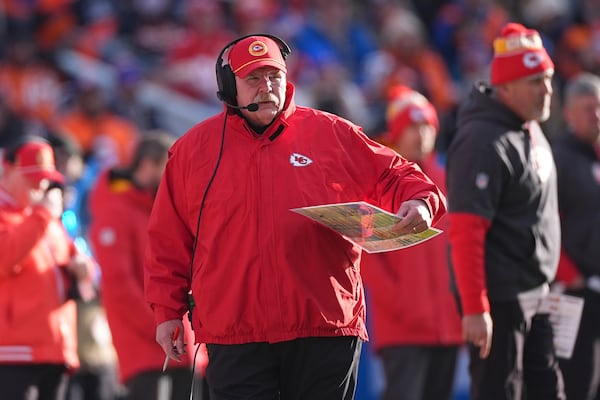 Kansas City Chiefs head coach Andy Reid watches from the sidelines during the first half of an NFL football game against the Denver Broncos Sunday, Jan. 5, 2025, in Denver. (AP Photo/David Zalubowski)