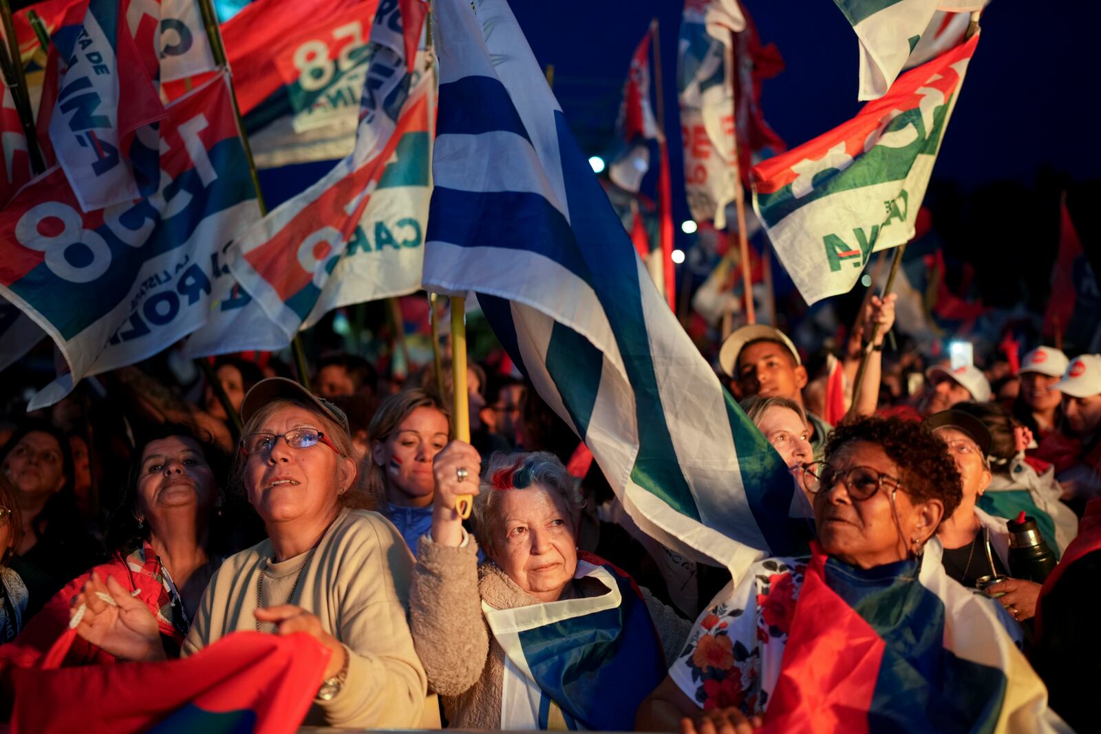 Supporters of Frente Amplio presidential candidate Yamandu Orsi attend a rally five days ahead of elections in Montevideo, Uruguay, Tuesday, Oct. 22, 2024. (AP Photo/Matilde Campodonico)