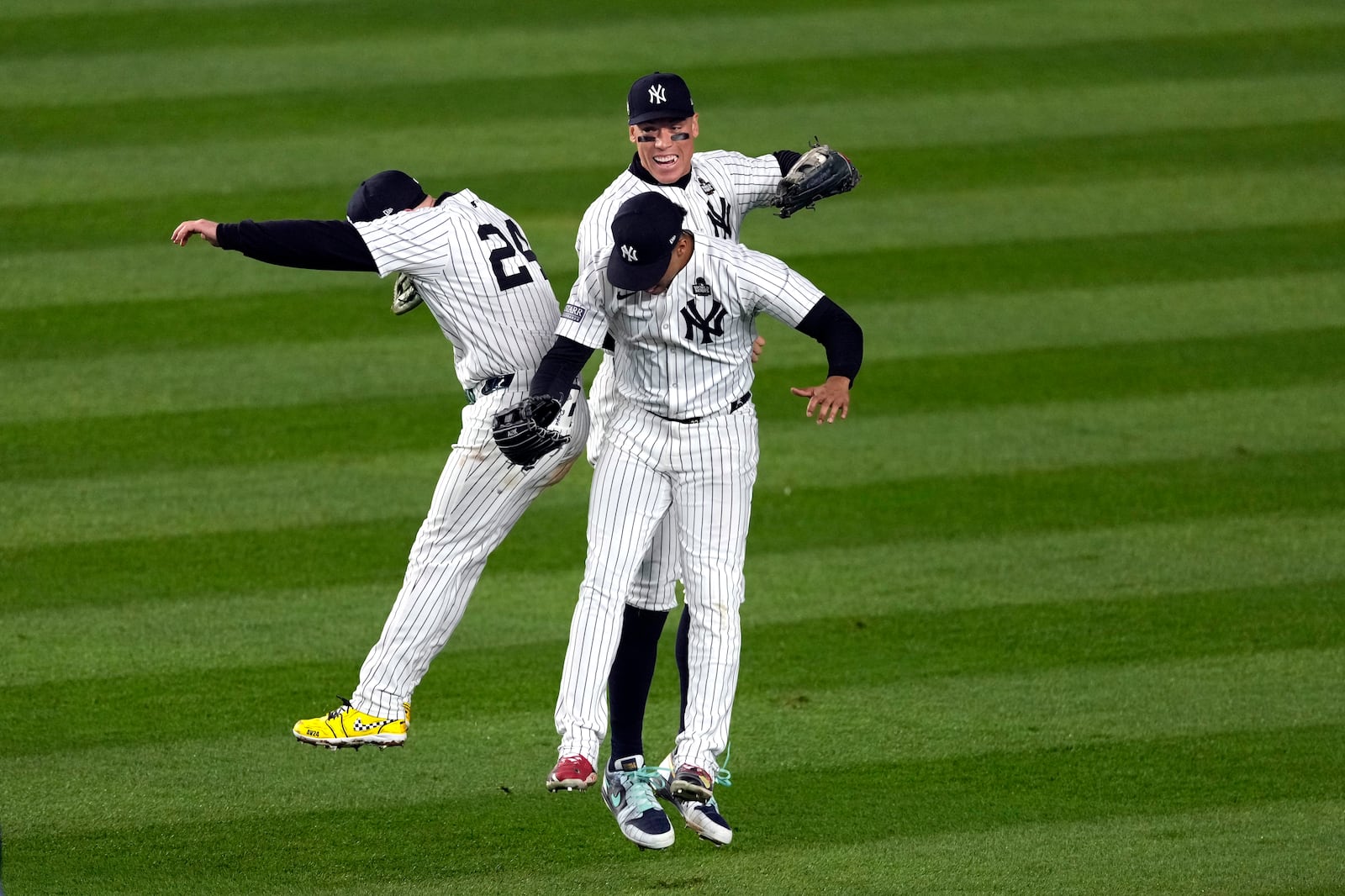 New York Yankees' Alex Verdugo (24), Aaron Judge and Juan Soto celebrate after Game 4 of the baseball World Series against the Los Angeles Dodgers, Tuesday, Oct. 29, 2024, in New York. The Yankees won 11-4. (AP Photo/Seth Wenig)