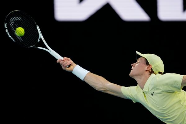 Jannik Sinner of Italy plays a forehand return to Alexander Zverev of Germany during the men's singles final at the Australian Open tennis championship in Melbourne, Australia, Sunday, Jan. 26, 2025. (AP Photo/Ng Han Guan)