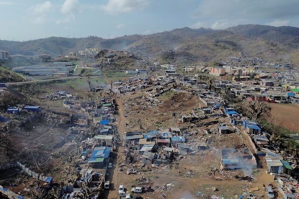 A drone view of the Barakani, Mayotte, informal settlement, Saturday, Dec. 21, 2024. (AP Photo/Adrienne Surprenant)