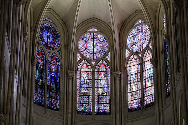 Windows in the heart of Notre-Dame de Paris cathedral are seen while French President Emmanuel Macron visits the restored interiors of the monument, Friday Nov. 29, 2024, in Paris. (Stephane de Sakutin, Pool via AP)