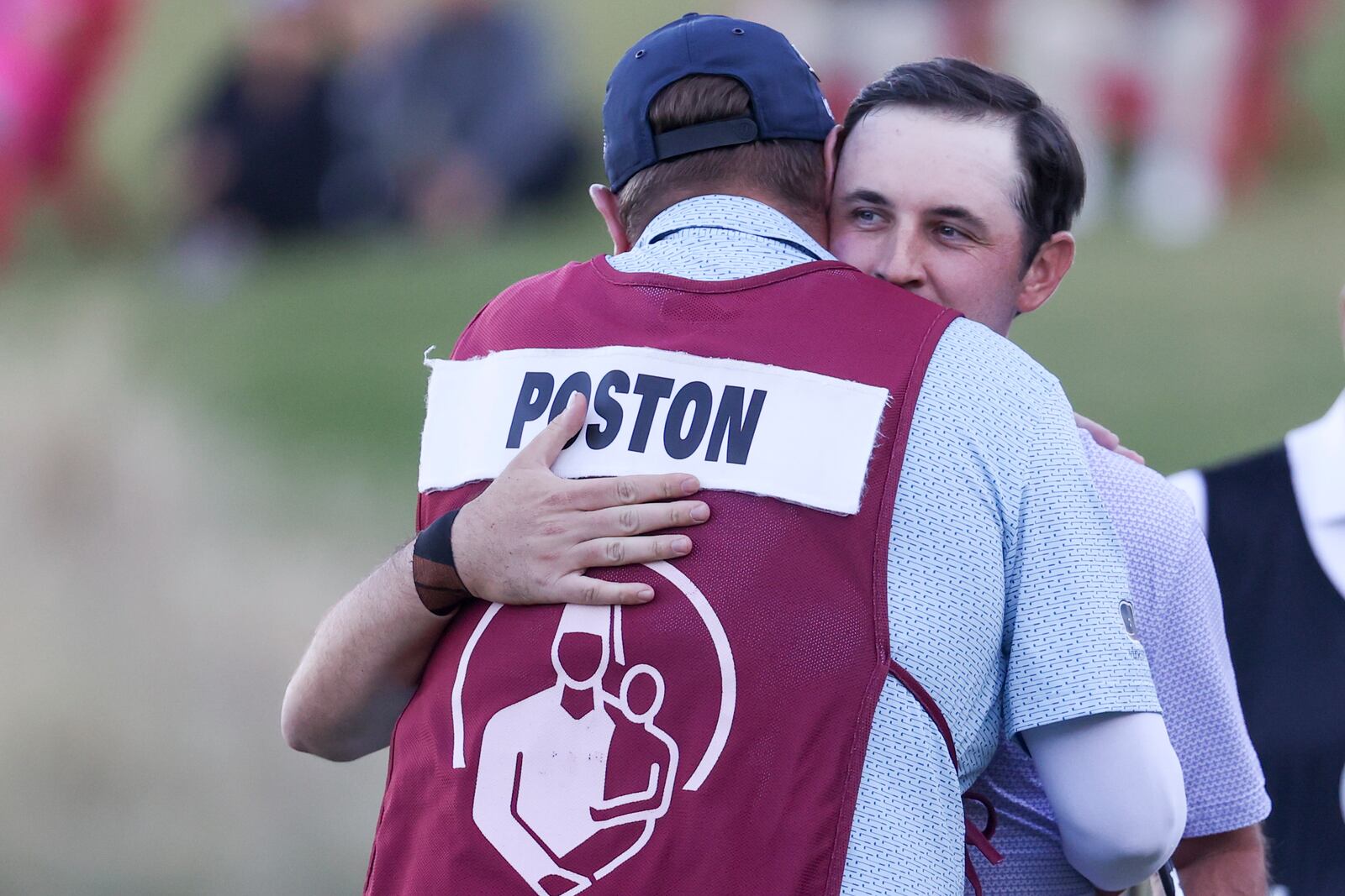 J.T. Poston hugs his caddie, Aaron Flener, after winning the Shriners Children's Open golf tournament, Sunday, Oct. 20, 2024, in Las Vegas. (AP Photo/Ian Maule)