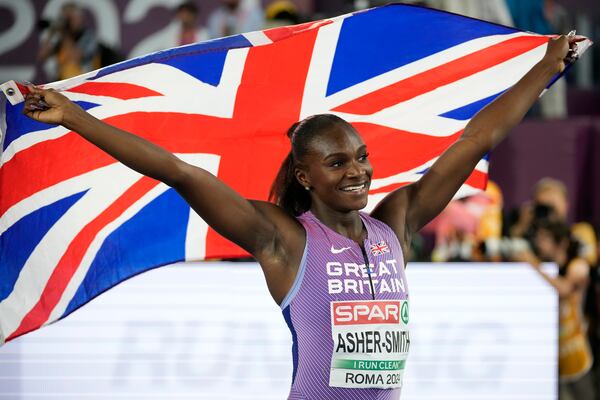 FILE - Dina Asher-Smith, of Britain, celebrates after winning the gold medal in the women's 100 meters final at the European Athletics Championships in Rome, Sunday, June 9, 2024. (AP Photo/Andrew Medichini, File)