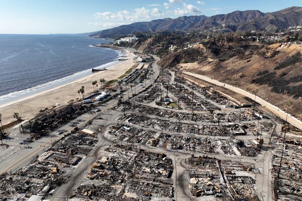 An aerial view shows the devastation left by the Palisades Fire in the Pacific Palisades section of Los Angeles, Monday, Jan. 27, 2025. (AP Photo/Jae C. Hong)