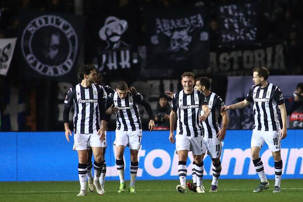 PAOK players celebrate a goal against Ferencvaros during the Europa League opening phase soccer match between PAOK and Ferencvaros at Toumpa stadium, in Thessaloniki, Greece, Thursday, Dec. 12, 2024. (AP Photo/Giannis Papanikos)