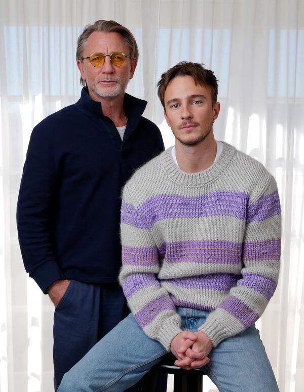 Daniel Craig, left, and Drew Starkey, cast members in the film "Queer," pose together for a portrait to promote the film on Wednesday, Nov. 13, 2024 in Los Angeles. (AP Photo/Chris Pizzello)