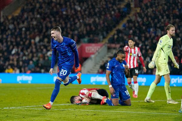 Chelsea's Cole Palmer celebrates scoring their side's fourth goal of the game during the Premier League soccer match between Southampton and Chelsea at St Mary's Stadium, Southampton, England, Wednesday Dec. 4, 2024. (Andrew Matthews/PA via AP)