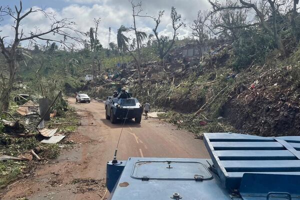 This photo provided Monday, Dec.16, 2024 by the Gendarmerie Nationale shows vehicles of the Gendarmerie Nationale driving on a road Sunday, Dec. 15, 2024 in Mayotte as France rushed rescue teams and supplies to its largely poor overseas department in the Indian Ocean that has suffered widespread destruction. (Gendarmerie Nationale via AP)