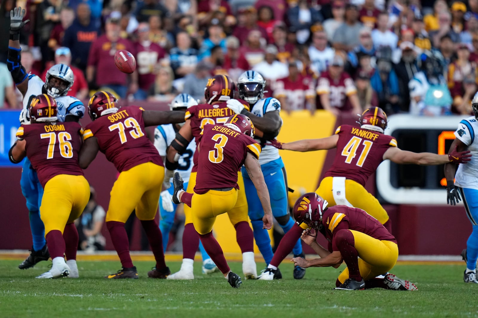 Washington Commanders place kicker Austin Seibert (3) kicks a field goal during the first half of an NFL football game against the Carolina Panthers, Sunday, Oct. 20, 2024, in Landover, Md. (AP Photo/Stephanie Scarbrough)