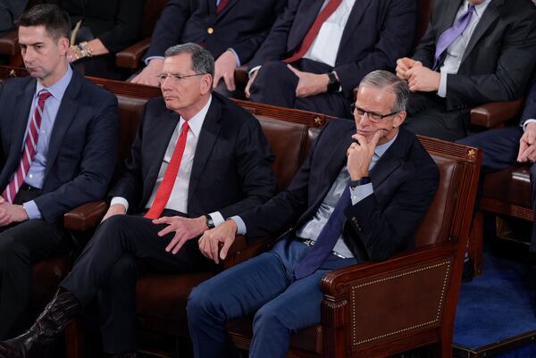 From left, Sen. Tom Cotton, R-Ark., Sen. John Barrasso, R-Wyo., and Senate Majority Leader John Thune, R-S.D., listen during a joint session of Congress to confirm the Electoral College votes, affirming President-elect Donald Trump's victory in the presidential election, Monday, Jan. 6, 2025, at the U.S. Capitol in Washington. (AP Photo/J. Scott Applewhite)