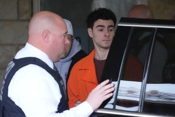 Luigi Nicholas Mangione leaves at Blair County Courthouse in Hollidaysburg, Pa., Thursday, Dec. 19, 2024. (AP Photo/Gene J. Puskar, Pool)