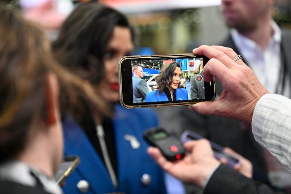 Michigan Gov. Gretchen Whitmer speaks to the media following a tour of the Detroit Auto Show, Wednesday, Jan. 15, 2025, in Detroit. (AP Photo/Jose Juarez)