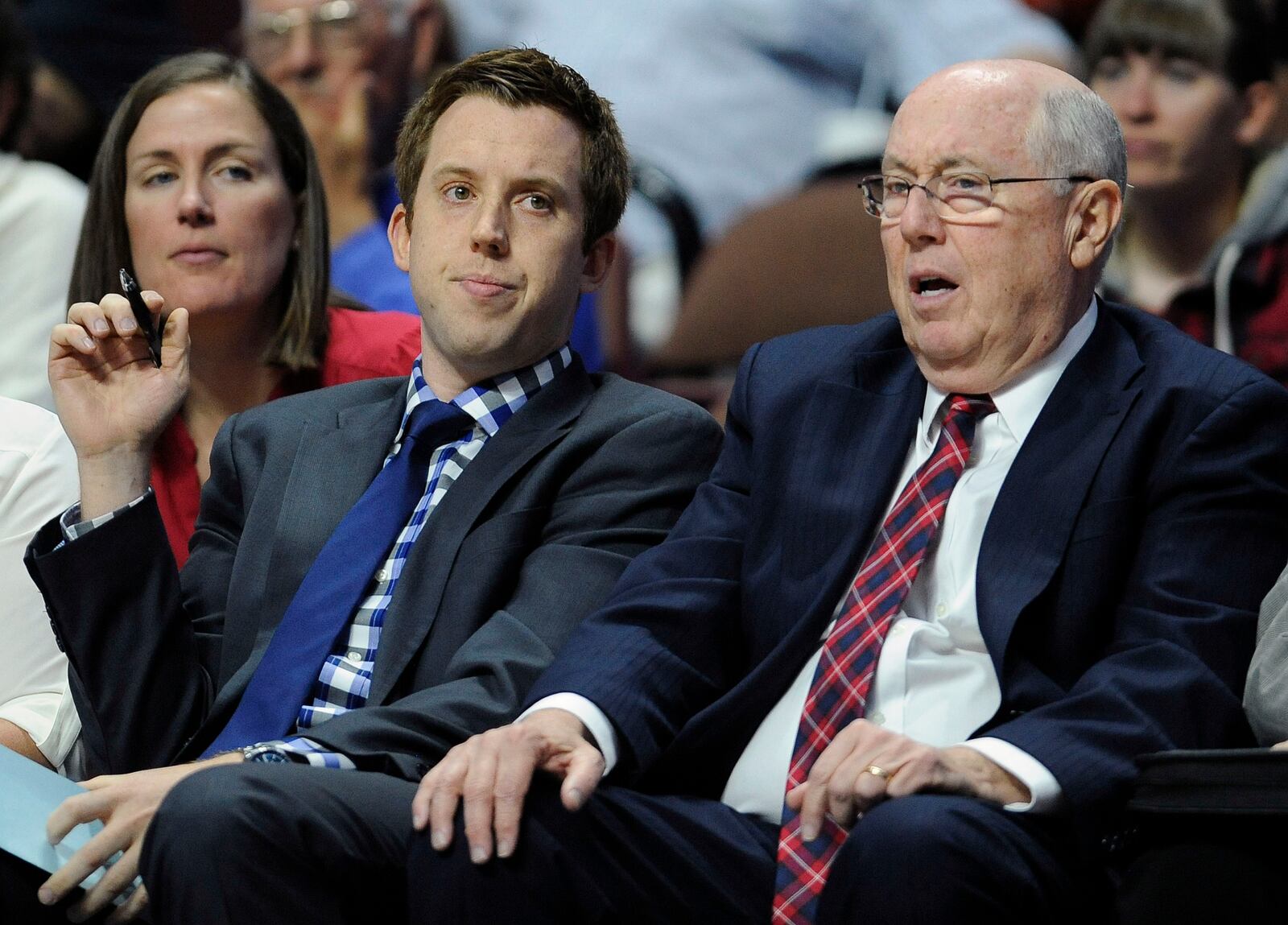 FILE - Washington Mystics head coach Mike Thibault, right, sits with his son assistant coach Eric Thibault, left, during the first half of a WNBA basketball game, June 14, 2016, in Uncasville, Conn. (AP Photo/Jessica Hill, File)