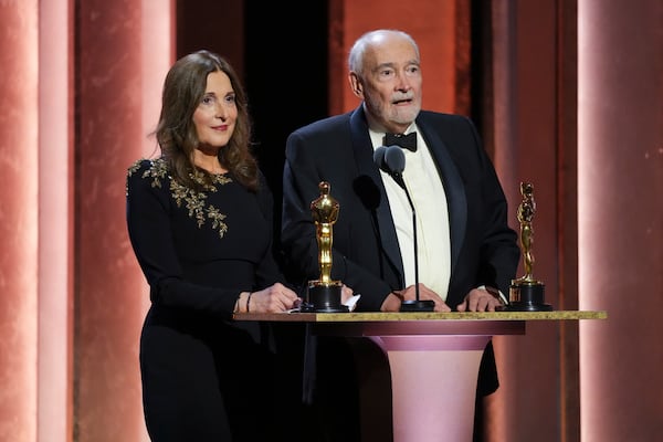 Barbara Broccoli, left, and Michael G. Wilson accept the Irving G. Thalberg Memorial Award during the 15th Governors Awards on Sunday, Nov. 17, 2024, at The Ray Dolby Ballroom in Los Angeles. (AP Photo/Chris Pizzello)