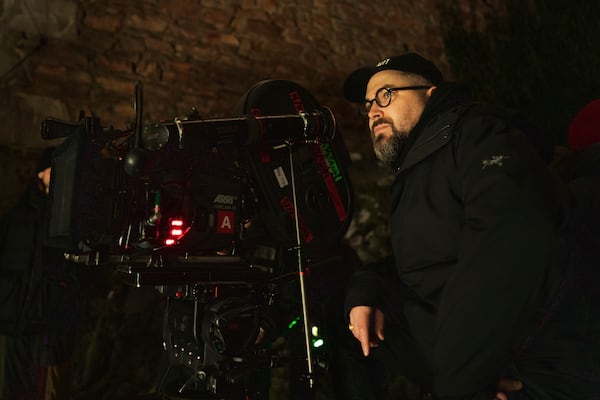 This image released by Focus Features shows director Robert Eggers on the set of "Nosferatu." (Focus Features via AP)