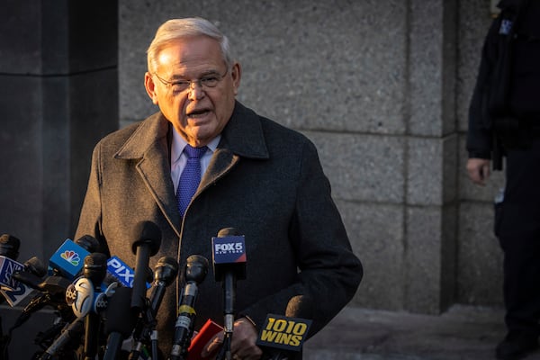 Former Sen. Bob Menendez, D-N.J., speaks to reporters outside federal court in New York, Wednesday, Jan. 29, 2025. (AP Photo/Stefan Jeremiah)