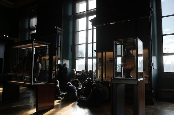 A group a students attend a course in Le Louvre museum, Monday, Jan. 27, 2025 in Paris. (AP Photo/Thibault Camus)