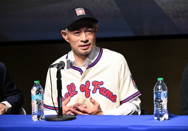 Newly elected Baseball Hall of Fame inductee Ichiro Suzuki talks to reporters during a news conference Thursday, Jan. 23, 2025, in Cooperstown, N.Y. (AP Photo/Hans Pennink)