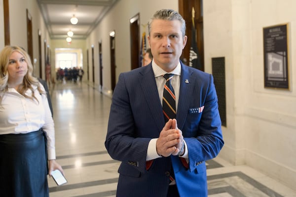 Pete Hegseth, President-elect Donald Trump's pick for secretary of defense, speaks with reporters following a meeting with senators on Capitol Hill, Thursday, Nov. 21, 2024, in Washington. (AP Photo/Rod Lamkey, Jr.)