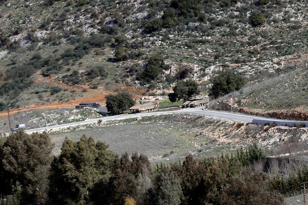 Israeli tanks maneuvers inside Wadi al-Saluki, southern Lebanon, Saturday, Jan. 25, 2025. (AP Photo/Mohammed Zaatari)