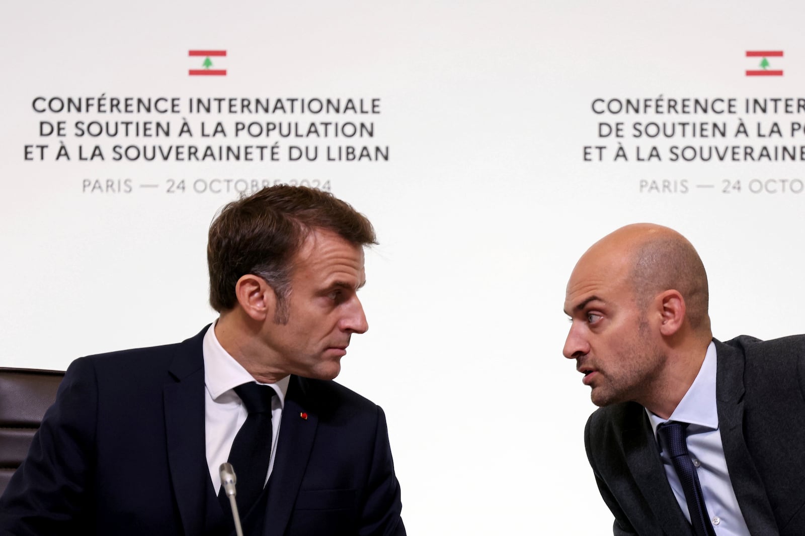 France's President Emmanuel Macron, left, talks with French Foreign Minister Jean-Noel Barrot during international conference for Lebanon in Paris, Thursday, Oct.24, 2024. (Alain Jocard, Pool via AP)