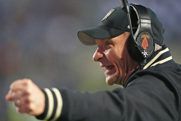 Army head coach Todd Monken directs his team during the first half of the Independence Bowl NCAA college football game against Louisiana Tech, Saturday, Dec. 28, 2024, in Shreveport, La. (AP Photo/Rogelio V. Solis)