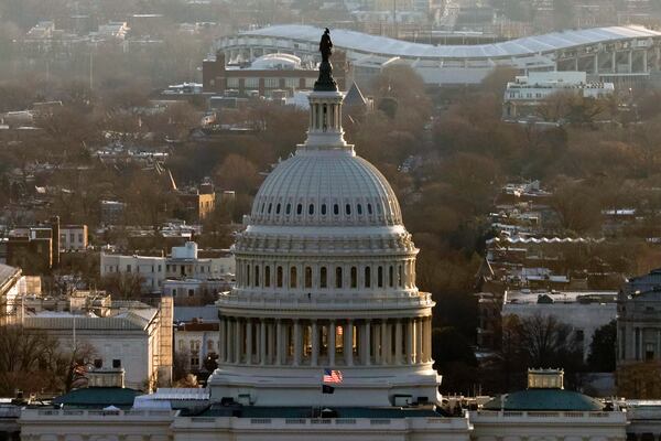 The U.S. Capitol is seen from the top of the Washington Monument at dawn on Inauguration Day, Monday, Jan.20, 2025 in Washington. (Brendan McDermid/Pool Photo via AP)