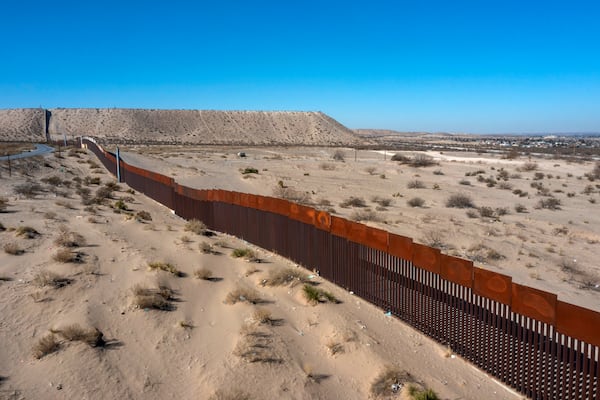 The border wall between Mexico, left, and the United States is pictured in Sunland Park, N.M., Tuesday, Jan. 21, 2025 in El Paso, Texas. (AP Photo/Andres Leighton)