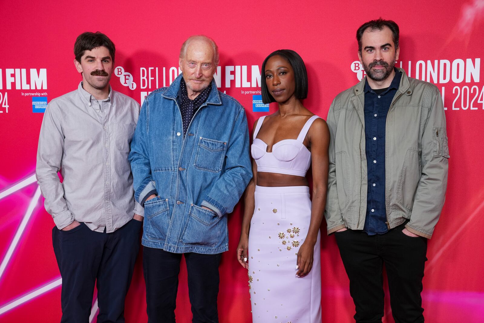 Director Evan Johnson, from left, Charles Dance, Nikki Amuka-Bird and director Galen Johnson pose for photographers upon arrival at the premiere of the film 'Rumours' during the London Film Festival on Sunday, Oct. 13, 2024, in London. (Photo by Scott A Garfitt/Invision/AP)