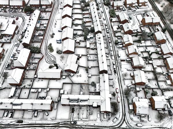 Snow blankets Lee Park in Liverpool, England, Sunday Jan. 5, 2025. (Peter Byrne/PA via AP)