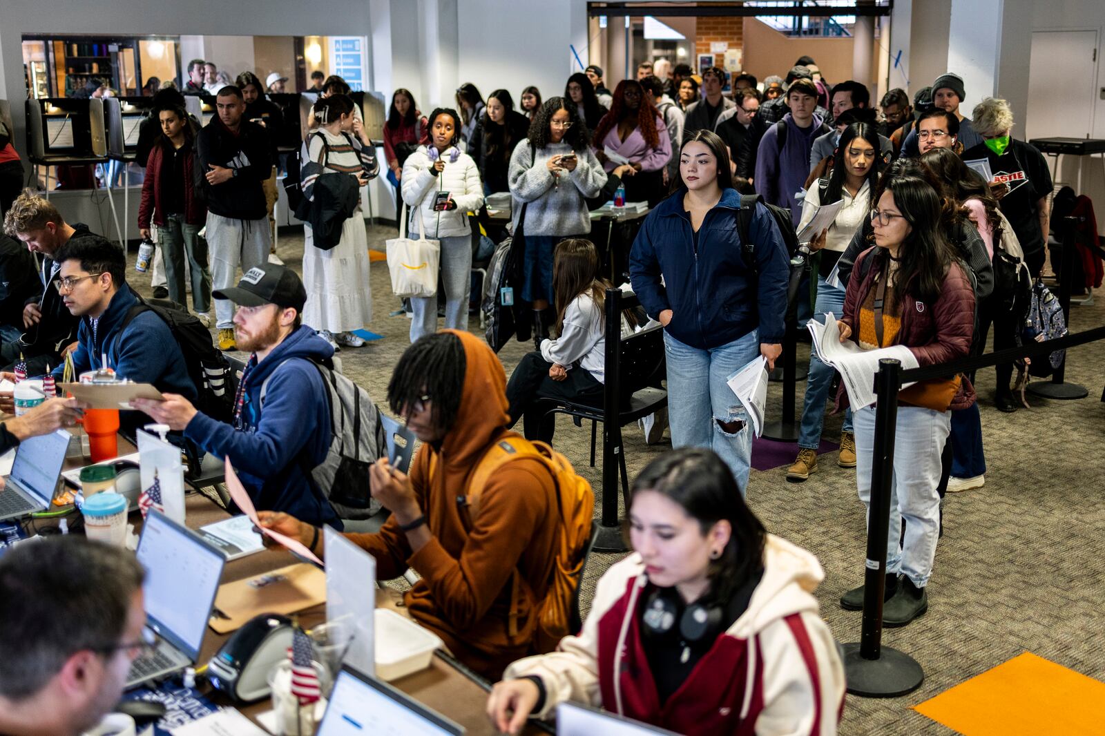 Voters cast ballots in Denver on Election Day, Tuesday, Nov. 5, 2024. (AP Photo/Chet Stgrange)