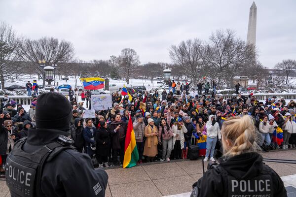 Supporters of Venezuelan opposition leader Edmundo Gonzalez gather outside of the Organization of American States, Monday, Jan. 6, 2025, in Washington. (AP Photo/Jacquelyn Martin)