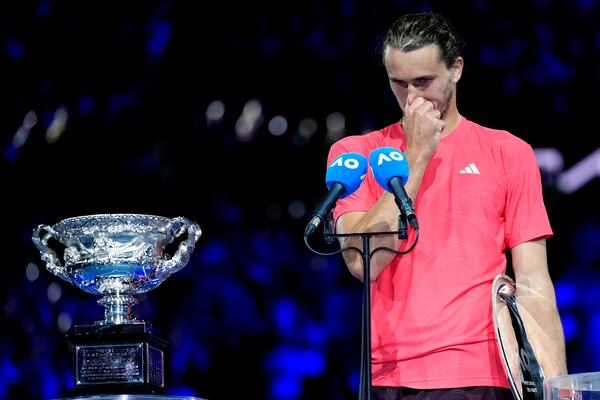 Alexander Zverev of Germany reacts as he speaks following his loss in the men's singles final against Jannik Sinner of Italy at the Australian Open tennis championship in Melbourne, Australia, Sunday, Jan. 26, 2025. (AP Photo/Asanka Brendon Ratnayake)