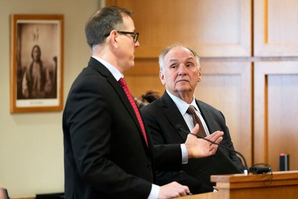 Jim Troupis appears in a Dane County courtroom with his attorney Joseph Bugni Wednesday, Dec. 12, 2024, in Madison, Wis. (AP Photo/Morry Gash)