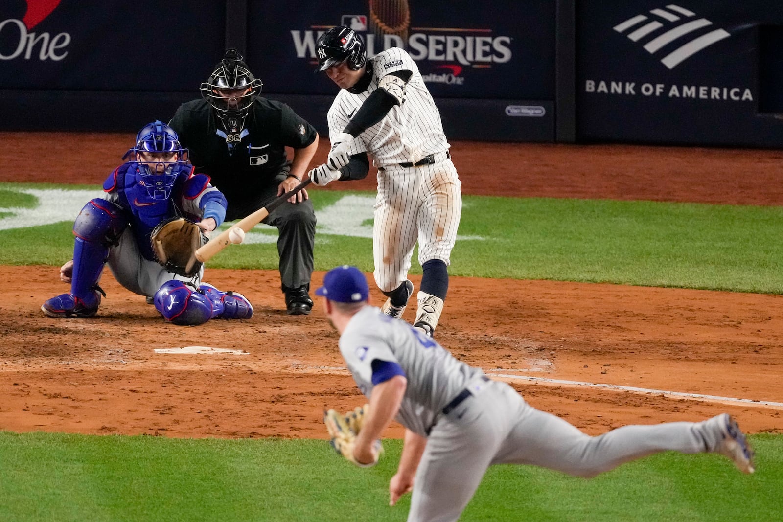 New York Yankees' Anthony Volpe hits a grand slam home run against the Los Angeles Dodgers during the third inning in Game 4 of the baseball World Series, Tuesday, Oct. 29, 2024, in New York. (AP Photo/Frank Franklin II)