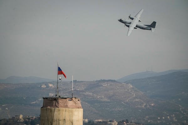 A Russian aircraft takes off at the Hmeimim Air Base, a Syrian airbase currently operated by Russia, located southeast of the city of Latakia in the town of Hmeimim, Syria, Monday Dec. 16, 2024.(AP Photo/Leo Correa)