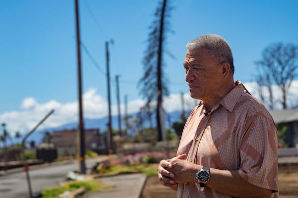 FILE - Maui Mayor Richard Bissen looks on during a media tour on Front Street, showing recovery efforts after 2023's wildfire, June 26, 2024, in Lahaina, Hawaii. (AP Photo/Mengshin Lin, File)