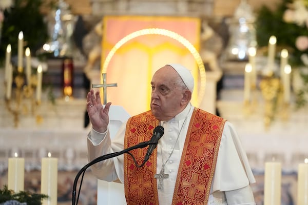 Pope Francis delivers the Angelus prayer inside the Cathedral of Our Lady of the Assumption of Ajaccio on the occasion of his one-day visit in the French island of Corsica, Sunday, Dec. 15, 2024. (AP Photo/Alessandra Tarantino)