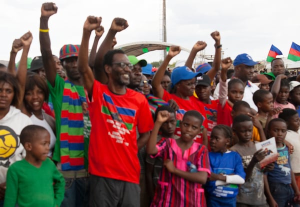 Members of the ruling South West Africa People's Organization, (SWAPO) attends an election rally in Windhoek, Namibia, Sunday, Nov. 24, 2024 ahead of elections Wednesday, Nov. 27, 2024. (AP Photo/Esther Mbathera)