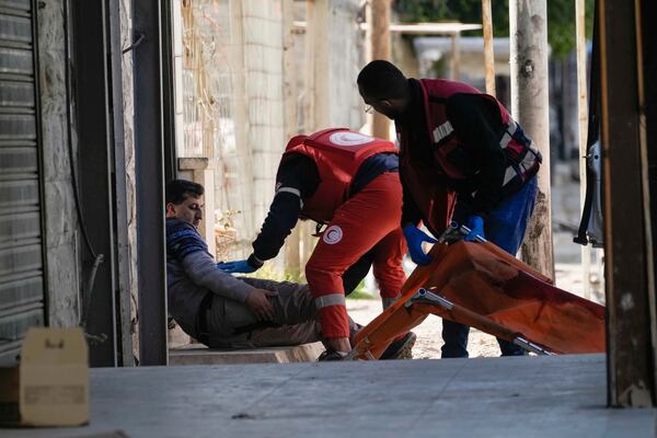 Medics evacuate a wounded man during an Israeli military operation in the West Bank city of Jenin, Tuesday, Jan. 21, 2025. (AP Photo/Majdi Mohammed).