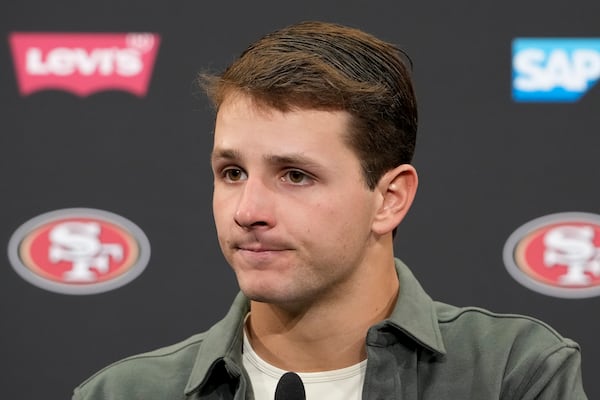 San Francisco 49ers quarterback Brock Purdy speaks at a news conference after an NFL football game against the Seattle Seahawks in Santa Clara, Calif., Sunday, Nov. 17, 2024. (AP Photo/Godofredo A. Vásquez)