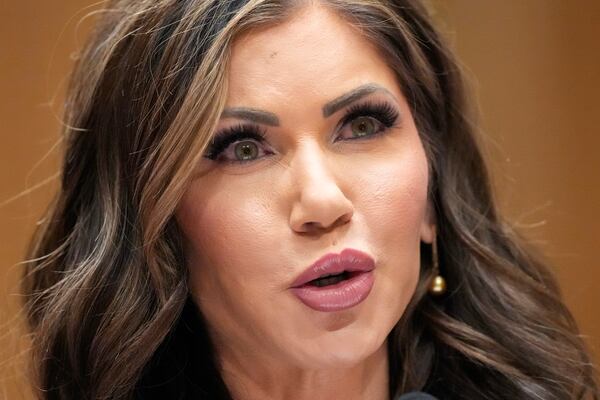 South Dakota Gov. Kristi Noem, President-elect Donald Trump's nominee to be Secretary of Homeland Security, appears before the Senate Homeland Security and Governmental Affairs Committee for her confirmation hearing, at the Capitol in Washington, Friday, Jan. 17, 2025. (AP Photo/Ben Curtis)