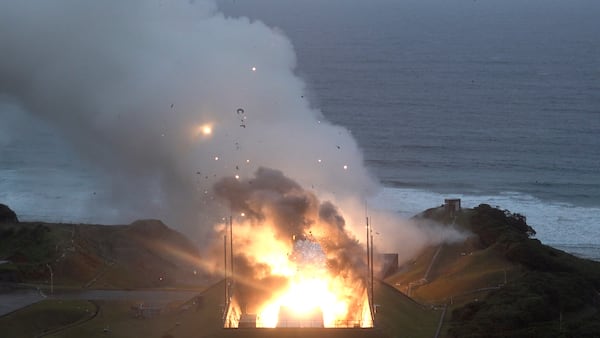 In this photo provided by Japan Aerospace Exploration Agency (JAXA), smoke and fire are seen during a combustion test of an engine for new small Japanese rocket Epsilon S at Tanegashima Space Center, Kagoshima prefecture, southern Japan, Tuesday, Nov. 26, 2024. (JAXA via AP)