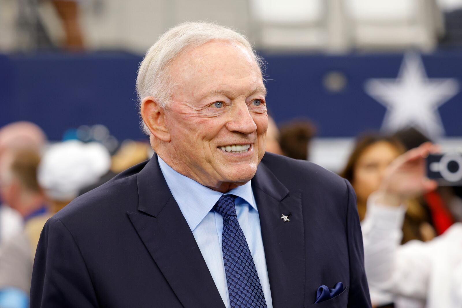 Dallas Cowboys team owner Jerry Jones stands on the field during warmups before an NFL football game against the Detroit Lions in Arlington, Texas, Sunday, Oct. 13, 2024. (AP Photo/Gareth Patterson)