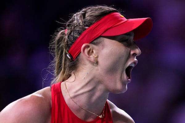 Spain's Paula Badosa reacts against Poland's Iga Swiatek during the Billie Jean King Cup Finals, at the Martin Carpena Sports Hall, in Malaga, southern Spain, on Friday, Nov. 15, 2024. (AP Photo/Manu Fernandez)