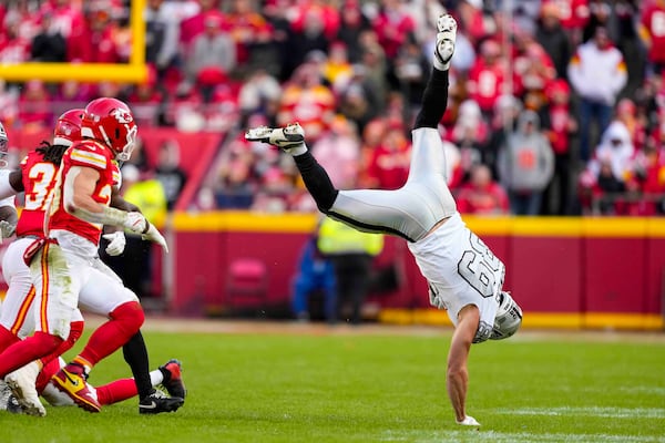 Las Vegas Raiders tight end Brock Bowers (89) hits the ground after catch against the Kansas City Chiefs during the first half of an NFL football game in Kansas City, Mo., Friday, Nov. 29, 2024. (AP Photo/Ed Zurga)